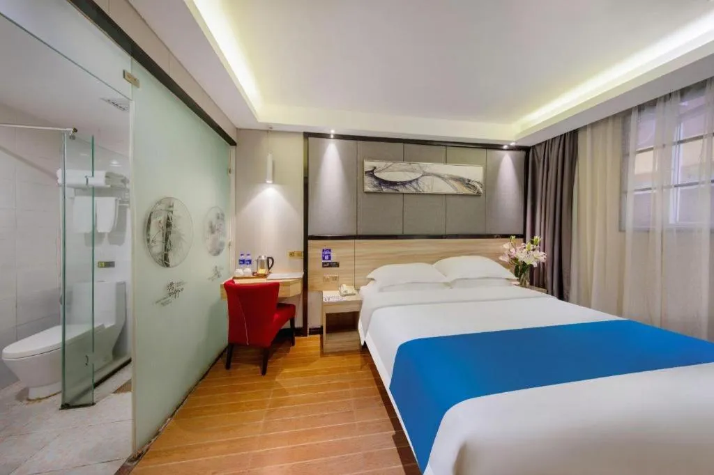 Bed in Wenxing Hotel Guangzhou Gangding Metro Station Branch