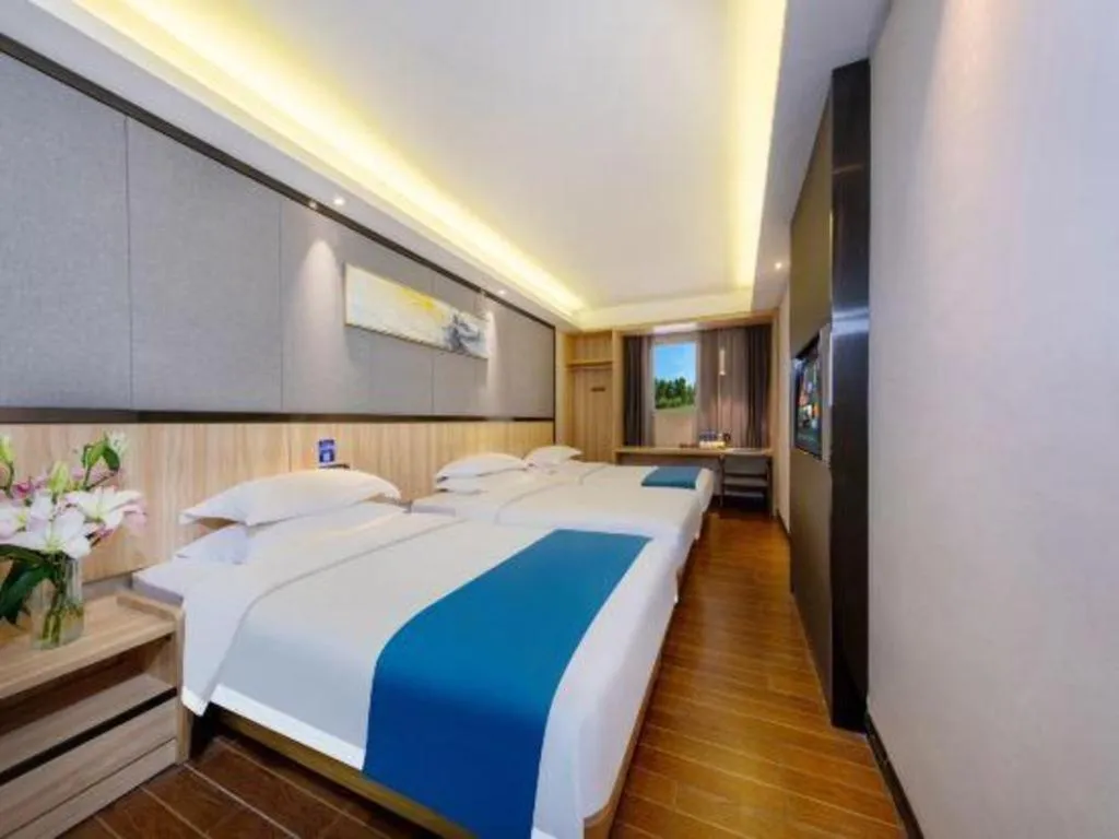 Bed in Wenxing Hotel Guangzhou Gangding Metro Station Branch