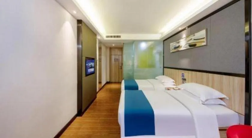 Bed in Wenxing Hotel Guangzhou Gangding Metro Station Branch