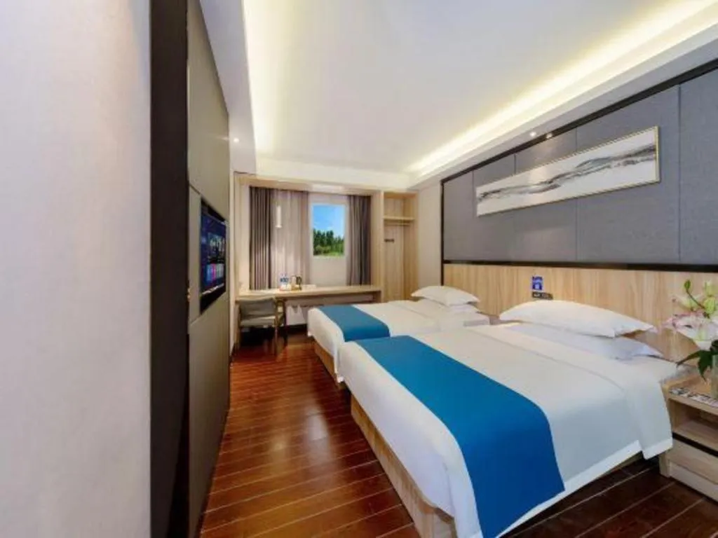 Bed in Wenxing Hotel Guangzhou Gangding Metro Station Branch