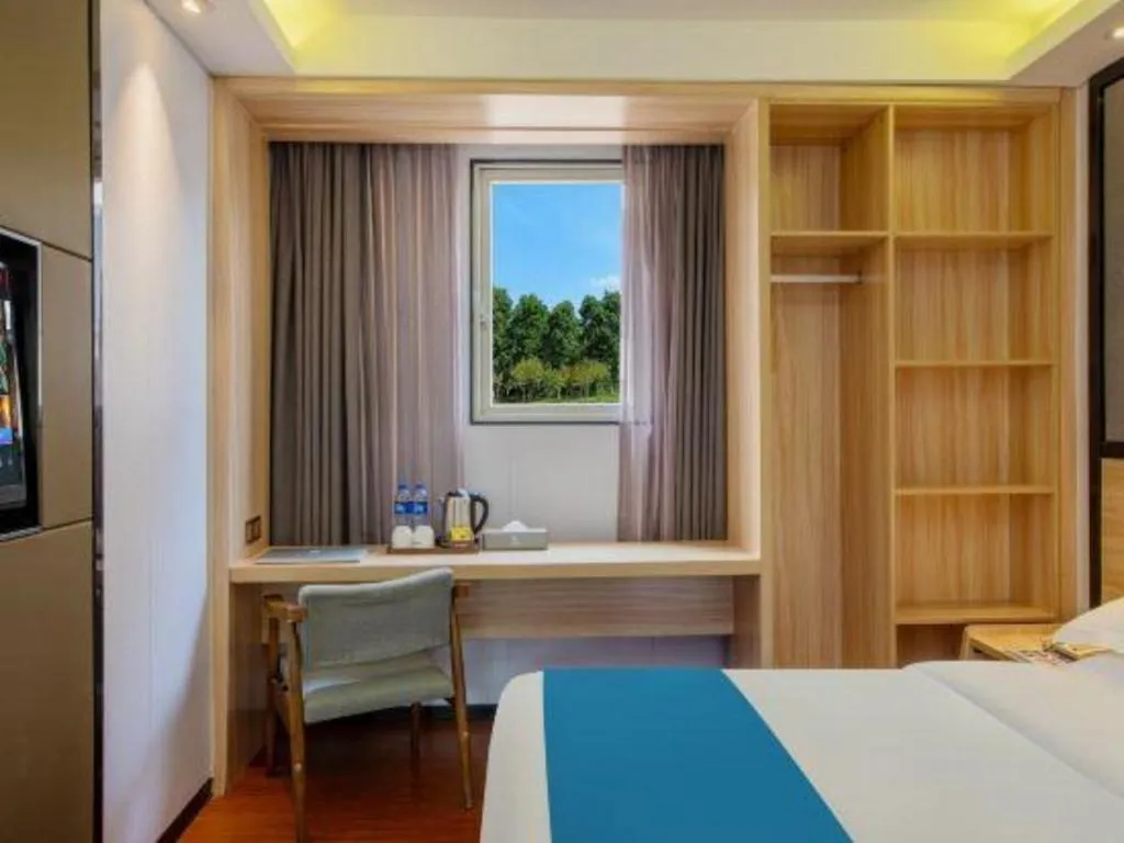 Bed in Wenxing Hotel Guangzhou Gangding Metro Station Branch