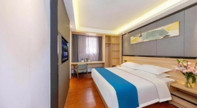 Bed in Wenxing Hotel Guangzhou Gangding Metro Station Branch