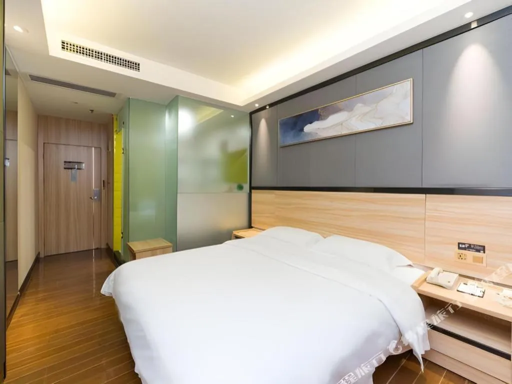 Bed in Wenxing Hotel Guangzhou Gangding Metro Station Branch