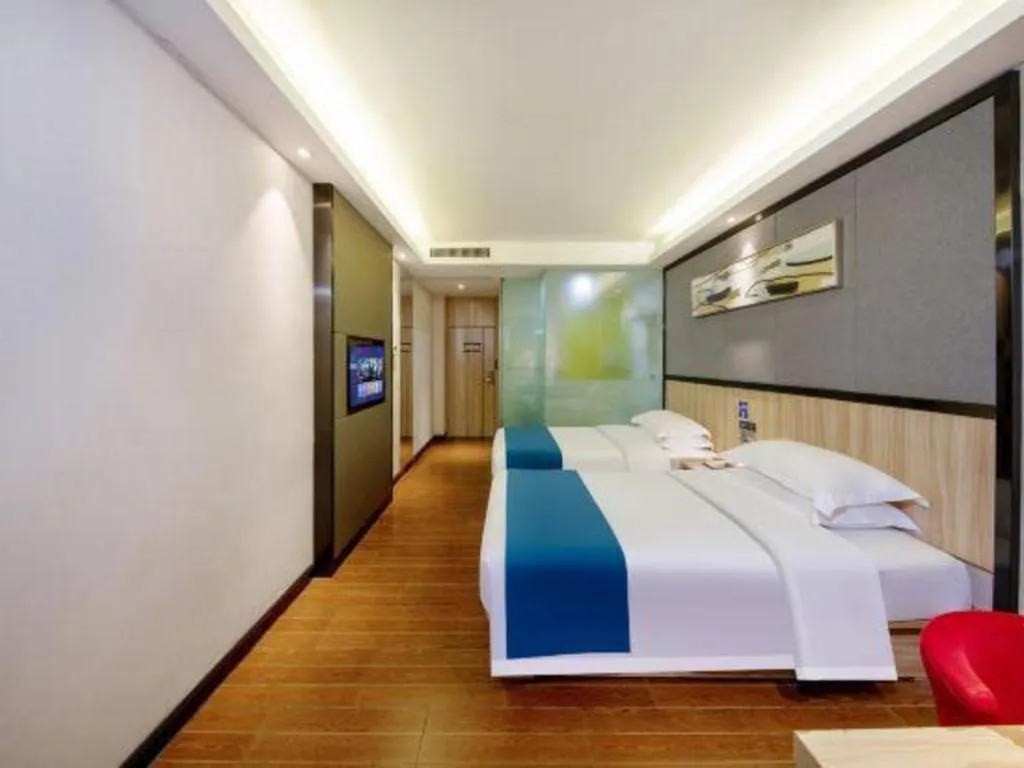 Bed in Wenxing Hotel Guangzhou Gangding Metro Station Branch