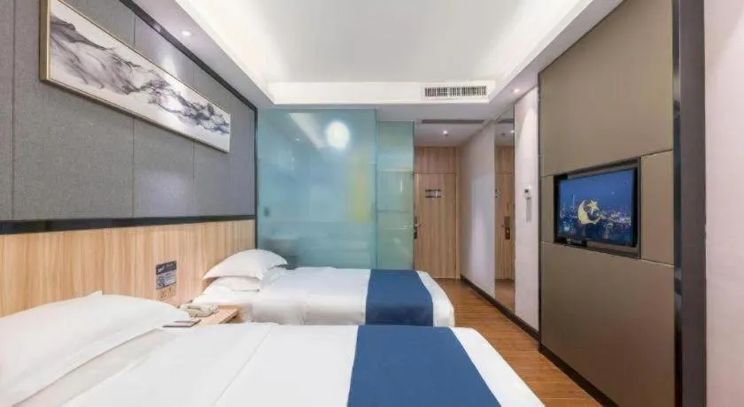 Bed in Wenxing Hotel Guangzhou Gangding Metro Station Branch