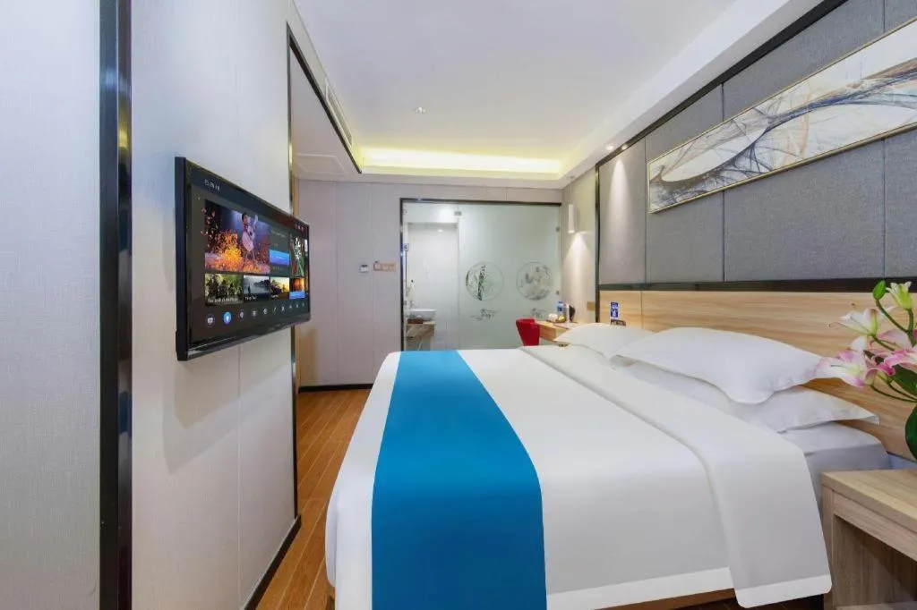 Bed in Wenxing Hotel Guangzhou Gangding Metro Station Branch