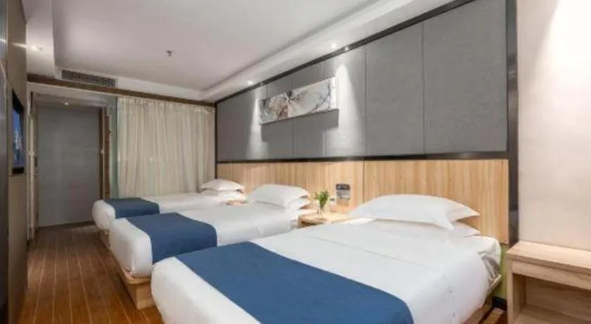 Bed in Wenxing Hotel Guangzhou Gangding Metro Station Branch