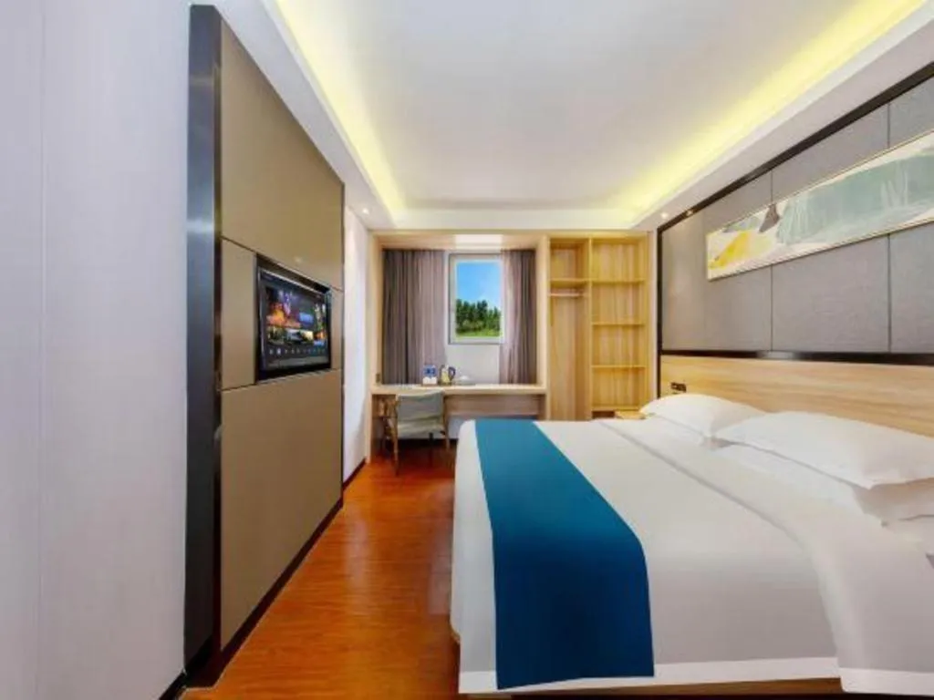 Bed in Wenxing Hotel Guangzhou Gangding Metro Station Branch