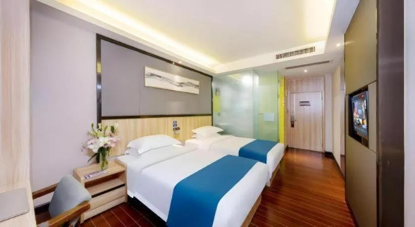 Bed in Wenxing Hotel Guangzhou Gangding Metro Station Branch