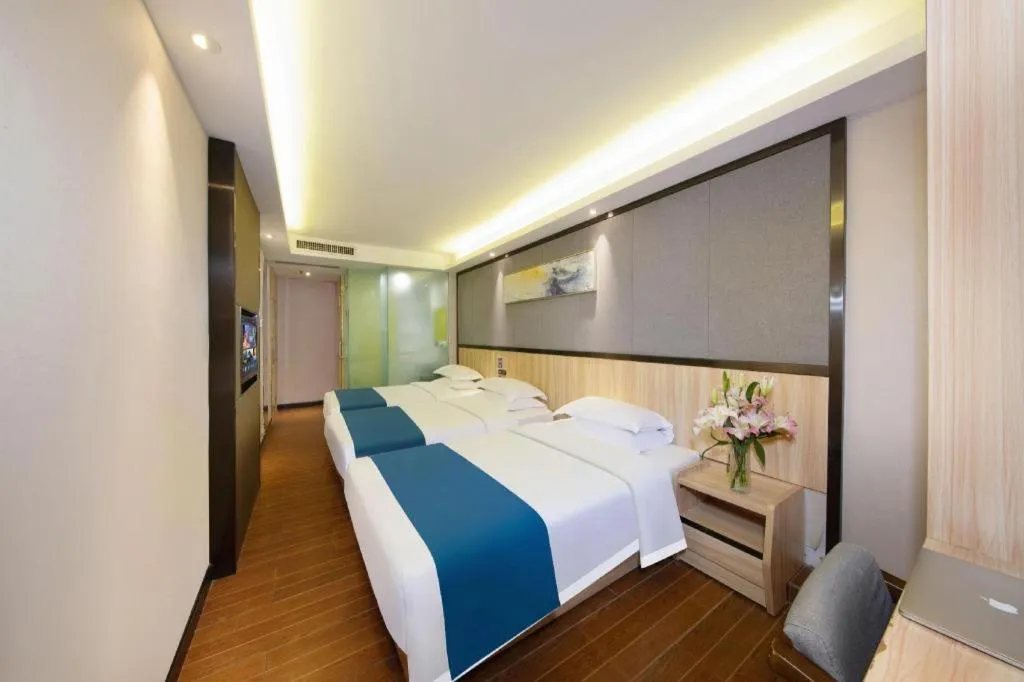 Bed in Wenxing Hotel Guangzhou Gangding Metro Station Branch