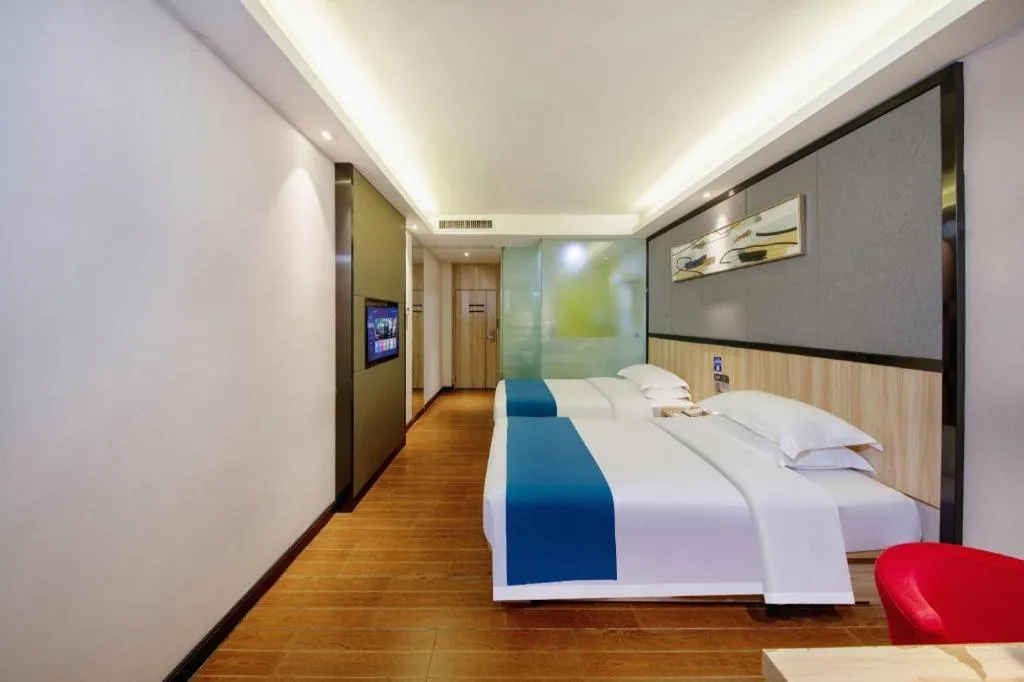 Bed in Wenxing Hotel Guangzhou Gangding Metro Station Branch