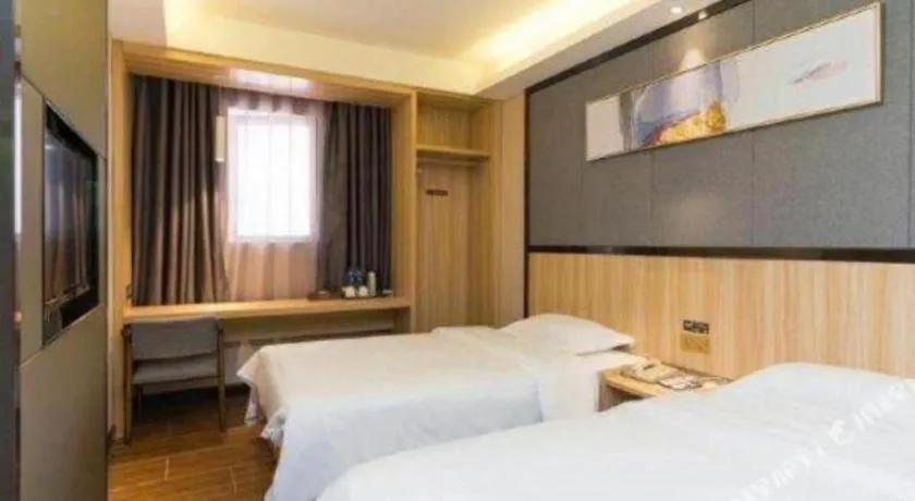 Bed in Wenxing Hotel Guangzhou Gangding Metro Station Branch