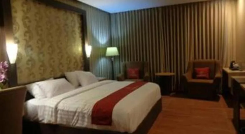 Bed in Grand Dian Hotel Slawi