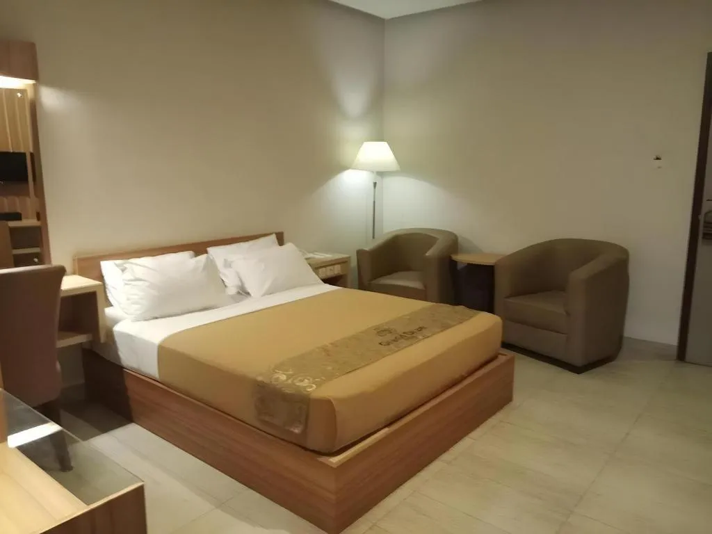 Bed in Grand Dian Hotel Slawi