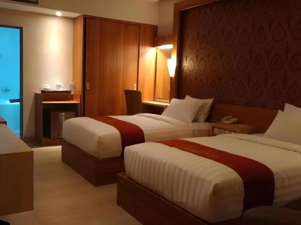 Bed in Grand Dian Hotel Slawi