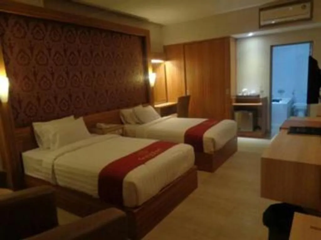 Bed in Grand Dian Hotel Slawi