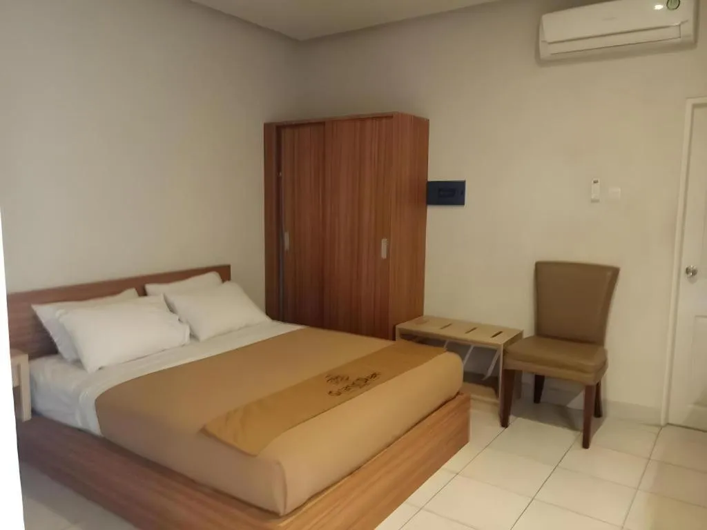 Bed in Grand Dian Hotel Slawi