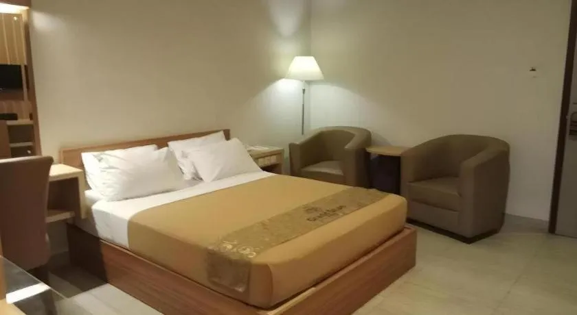 Bed in Grand Dian Hotel Slawi