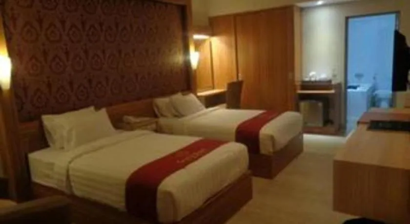 Bed in Grand Dian Hotel Slawi