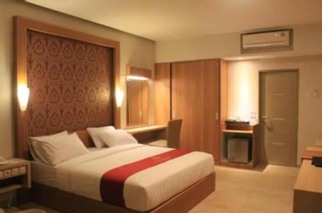 Bed in Grand Dian Hotel Slawi