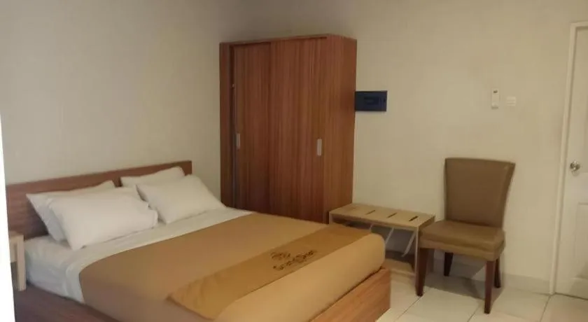 Bed in Grand Dian Hotel Slawi