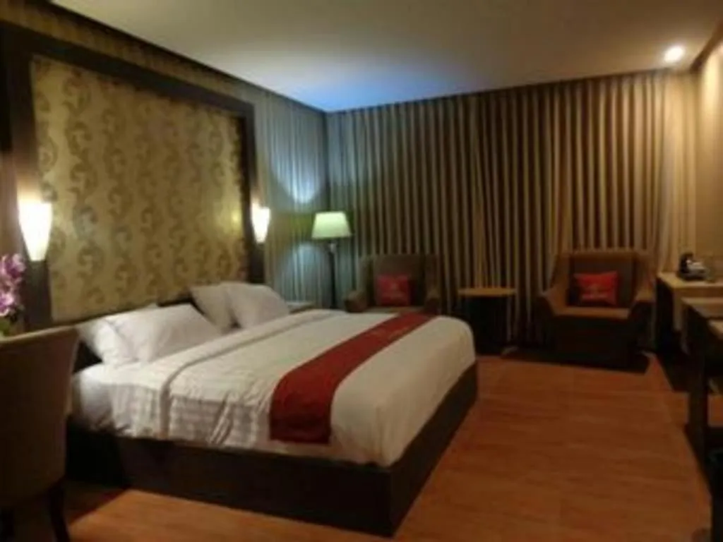 Bed in Grand Dian Hotel Slawi