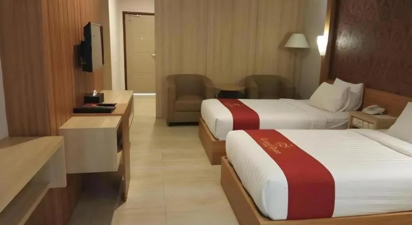 Bed in Grand Dian Hotel Slawi