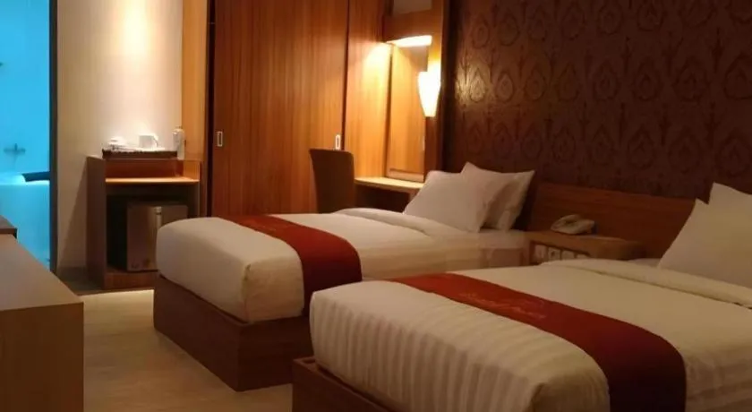 Bed in Grand Dian Hotel Slawi