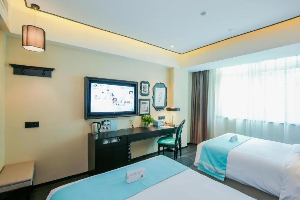 Bed in Xana Hotelle·Xiamen Railway Station