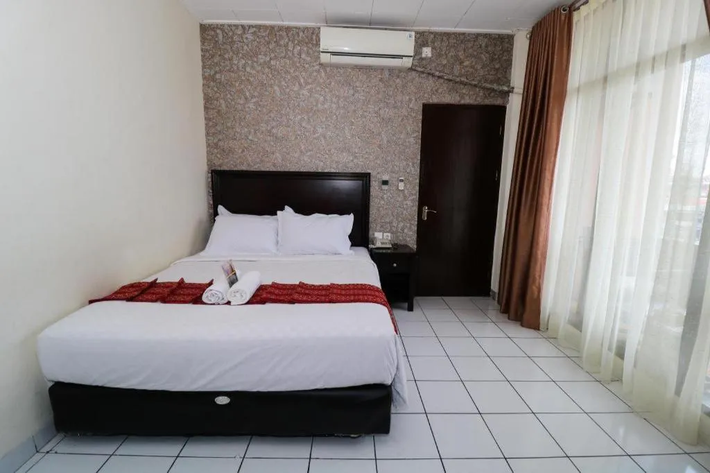 Bed in Hotel Benteng