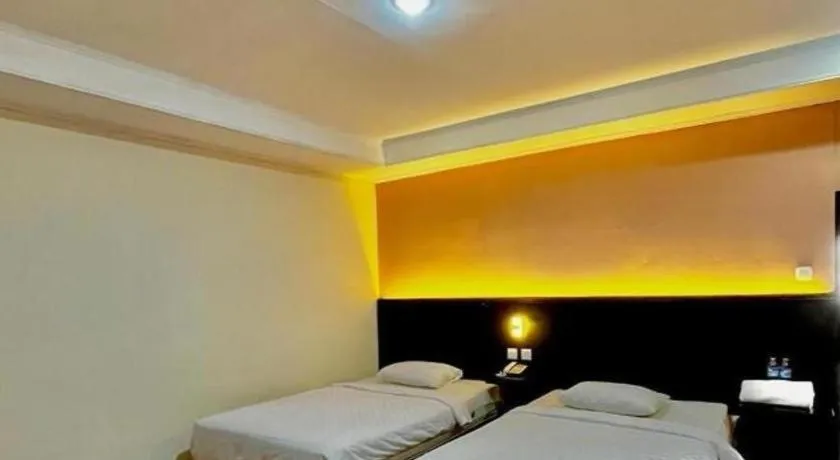 Bed in Hotel Benteng