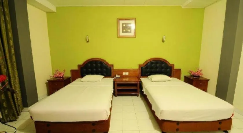 Bed in Hotel Benteng
