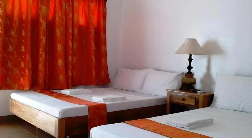 Bed in Anda de Boracay in Bohol Hotel