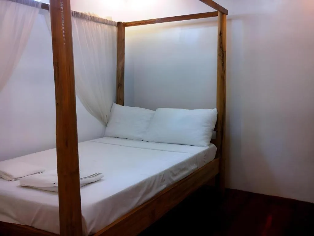 Bed in Anda de Boracay in Bohol Hotel