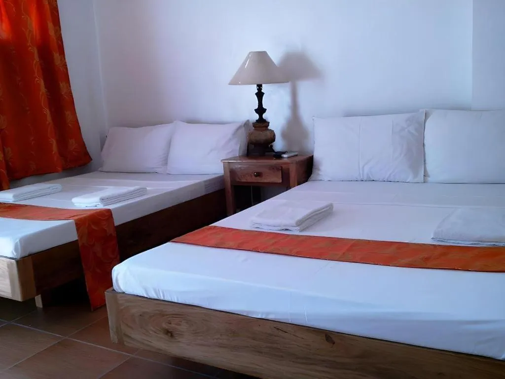 Bed in Anda de Boracay in Bohol Hotel