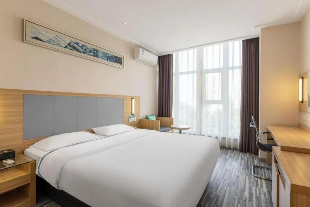 Bed in City Comfort Inn Enshi Shizhou Avenue