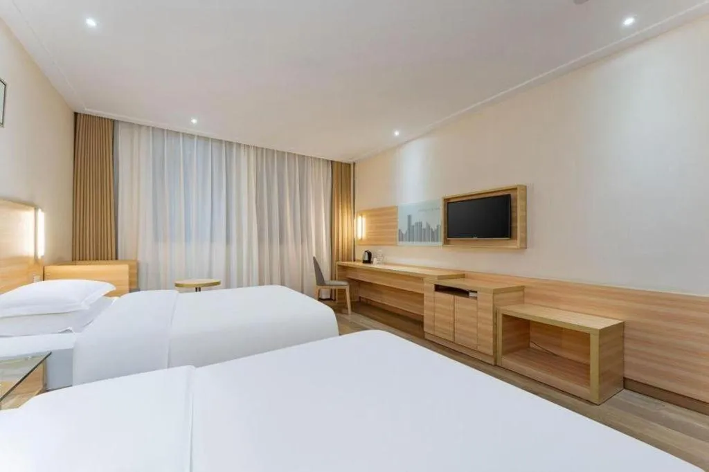 Bed in City Comfort Inn Enshi Shizhou Avenue