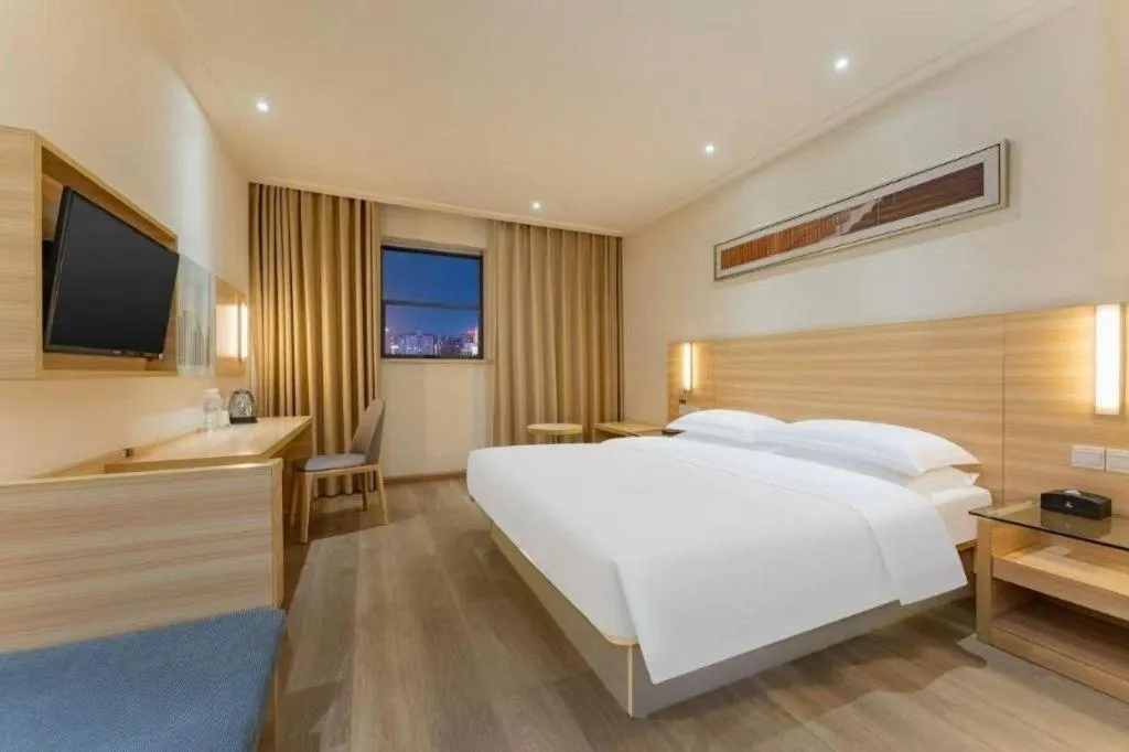 Bed in City Comfort Inn Enshi Shizhou Avenue
