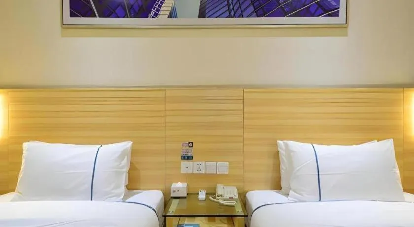 Bed in City Comfort Inn Enshi Shizhou Avenue