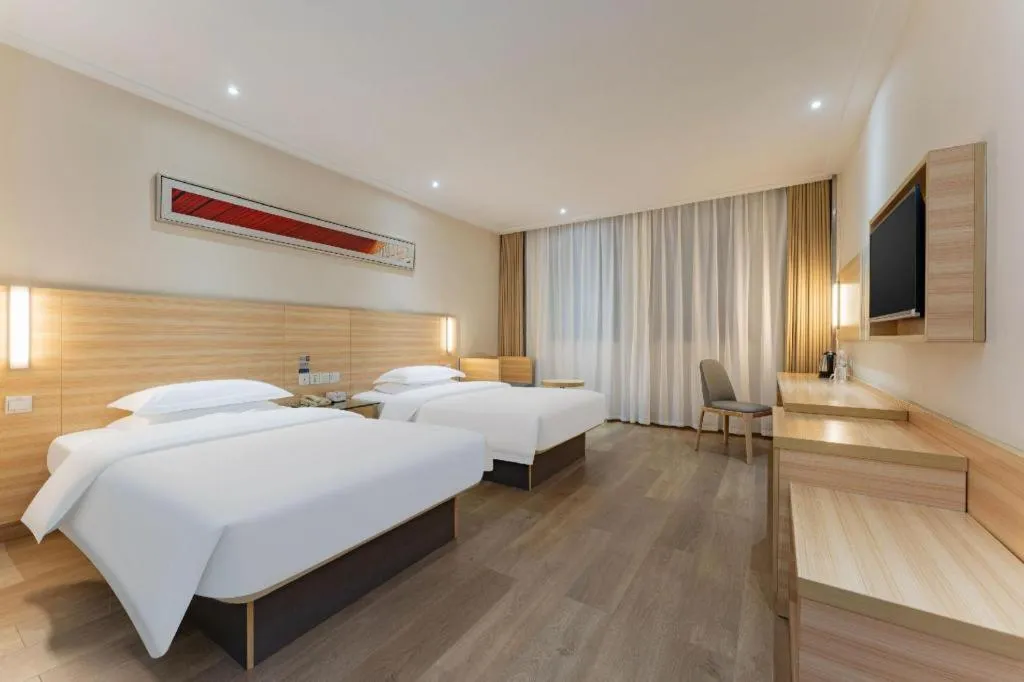 Bed in City Comfort Inn Enshi Shizhou Avenue