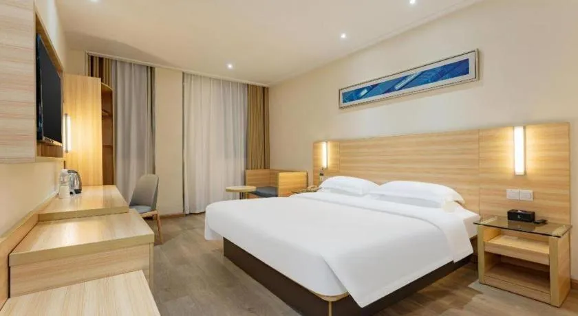 Bed in City Comfort Inn Enshi Shizhou Avenue