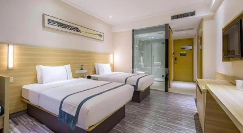 Bed in City Comfort Inn Enshi Shizhou Avenue