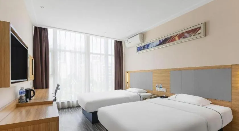 Bed in City Comfort Inn Enshi Shizhou Avenue