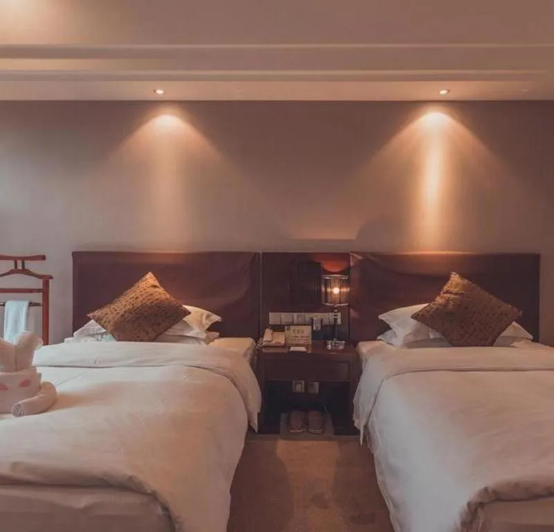 Bed in Kunming Wenhui Hotel