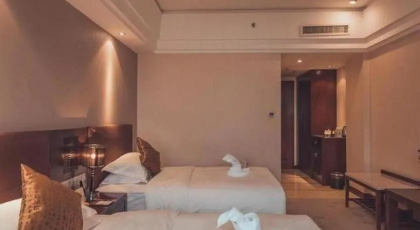 Bed in Kunming Wenhui Hotel