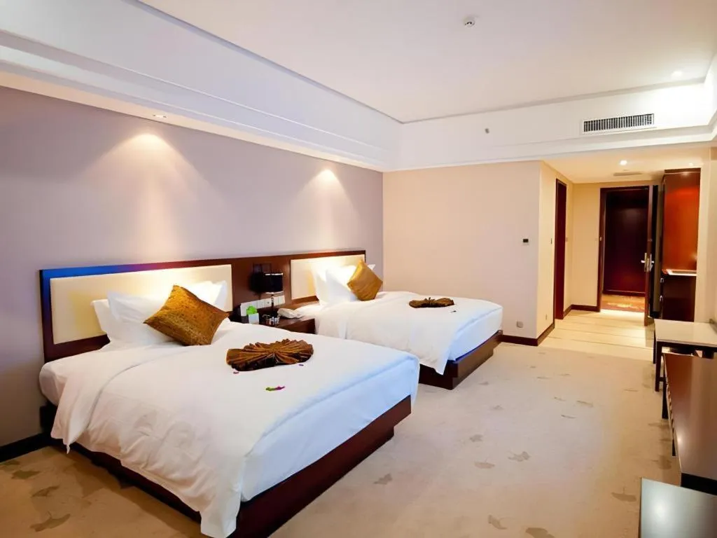 Bed in Kunming Wenhui Hotel