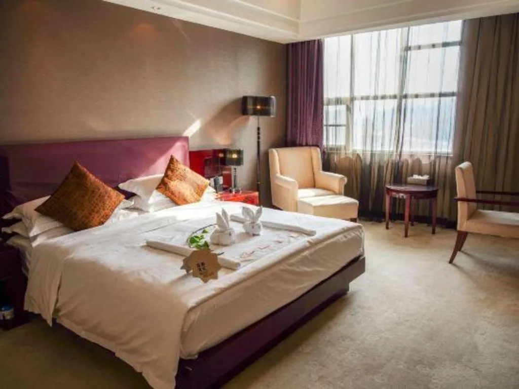 Bed in Kunming Wenhui Hotel