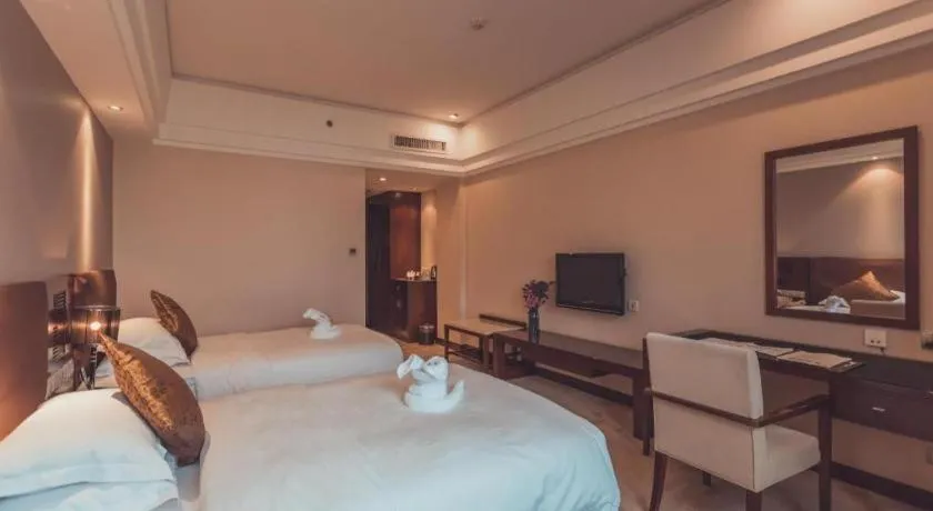 Bed in Kunming Wenhui Hotel