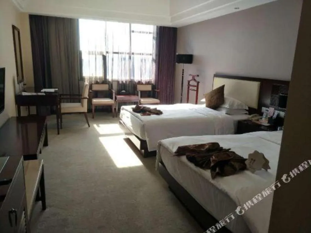 Bed in Kunming Wenhui Hotel