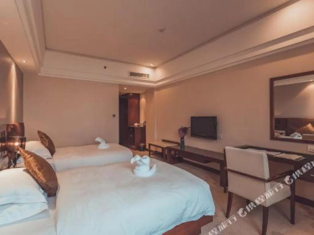 Bed in Kunming Wenhui Hotel